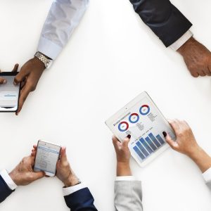 Business people using digital devices isolated on white background